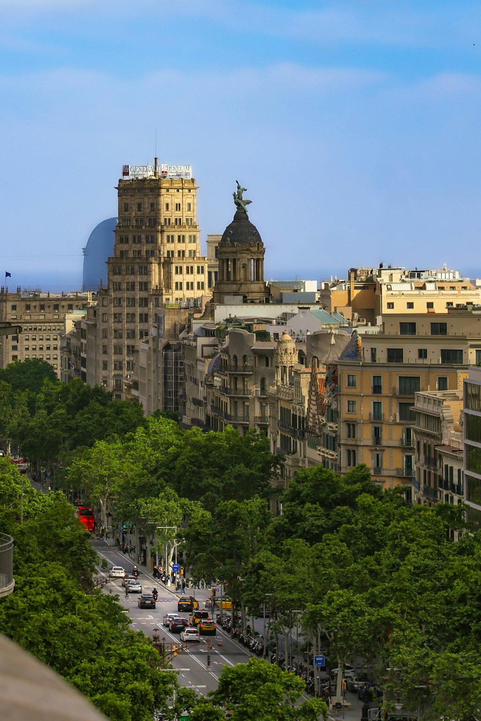 Elevated view of iconic Barcelona cityscape and famous architectural landmarks on a clear day.